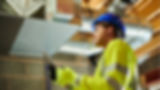 Maintenance employee inspecting the building HVAC system